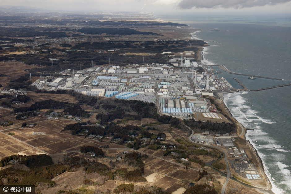 震后五年访福岛第一核电站 工人穿防辐射服作业