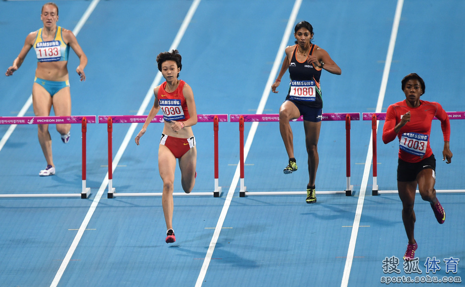 高清:亚运女子400米栏 中国选手肖霞获得季军-体育图片库-大视野-搜狐