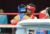 2010年11月25日，中国广州，2010亚运会拳击男子60公斤级决赛，胡青4-5克里尚-维卡斯。