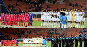 11月22日晚，日本女足战胜朝鲜女足获得广州亚运会女子足球冠军。在颁奖仪式上朝鲜队员和日本队员悲喜两...